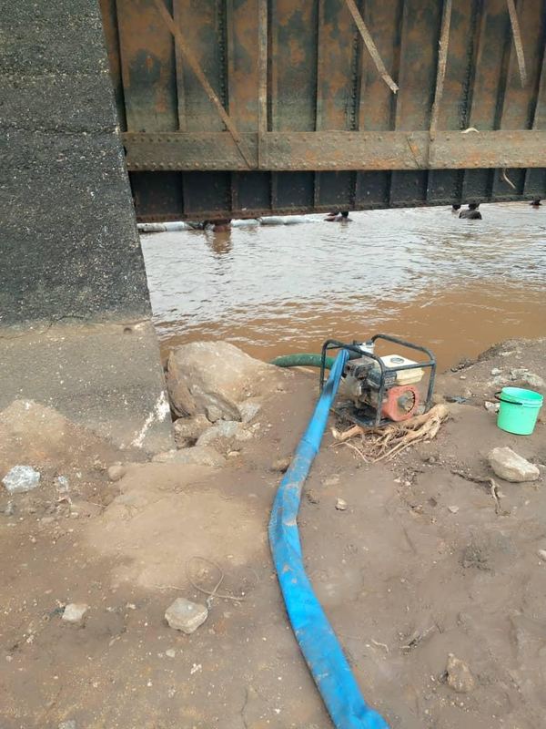 Dewatering pump drawing down the work area