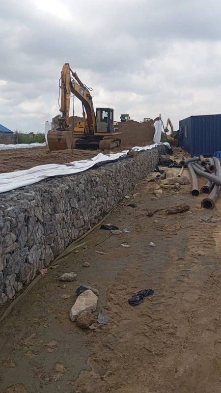Gabion revetment to the channel bank