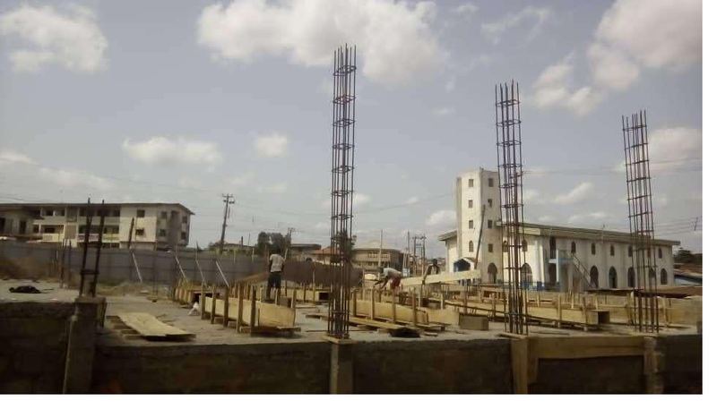 Reinforced concrete columns rising above the platform