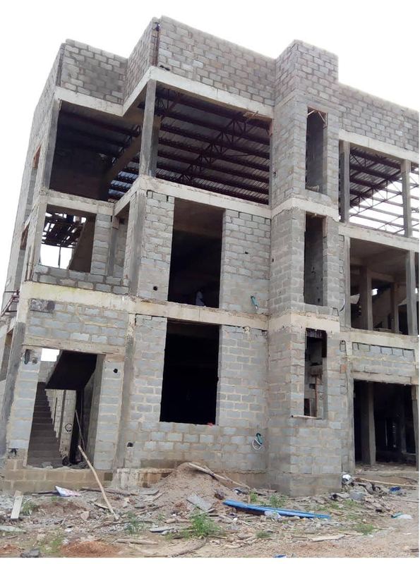 Three-storey frame with blockwork envelope