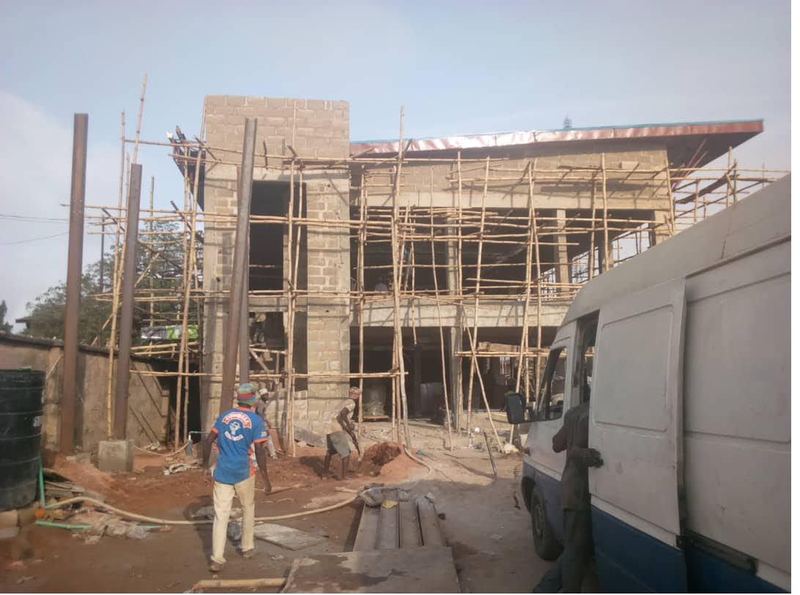 Two structures under simultaneous construction