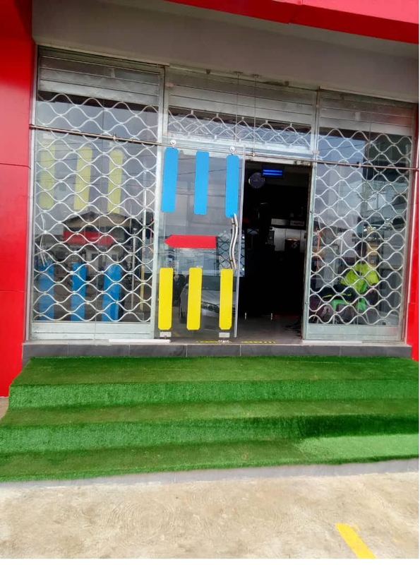 Shopfront: glazing, shutter and colour banding