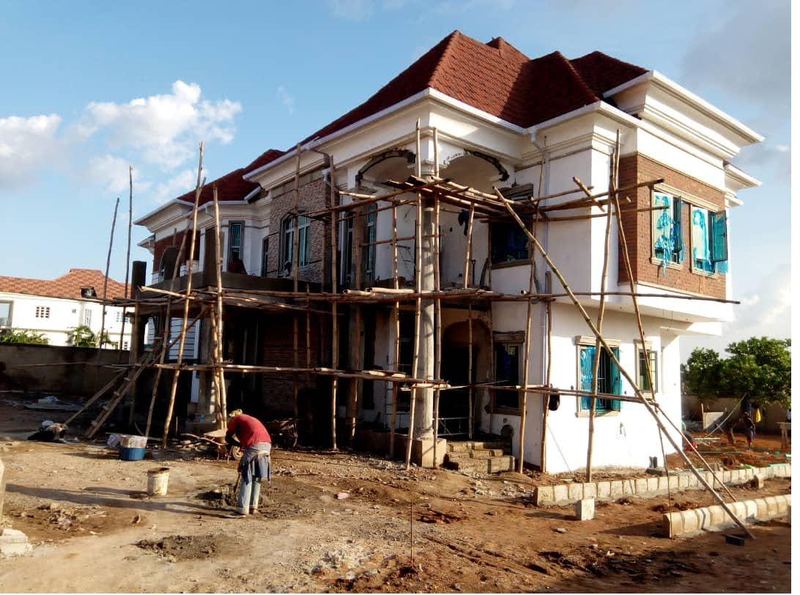 Roof tiling and scaffold to the second unit