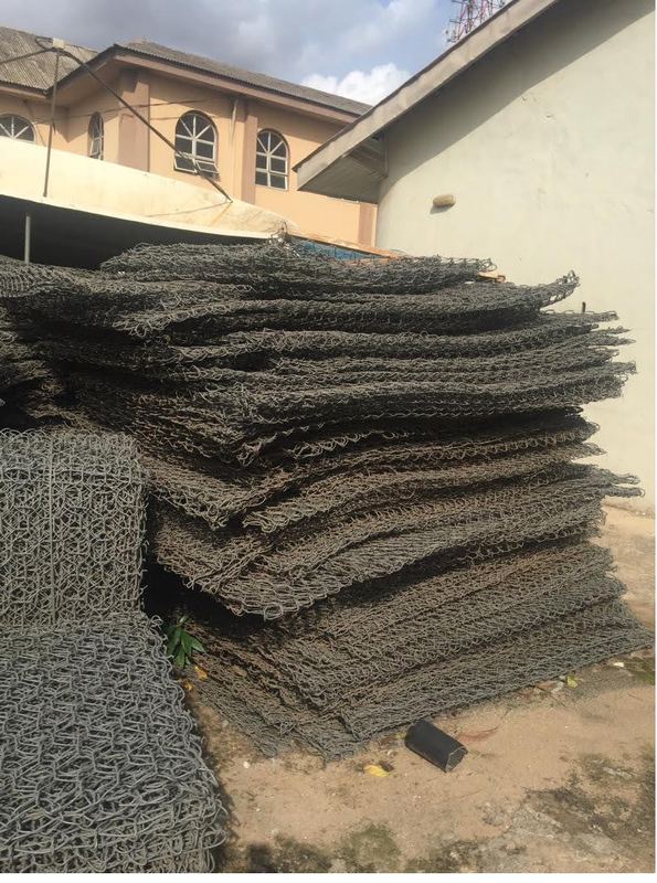 Gabion mattresses stockpiled for the revetment