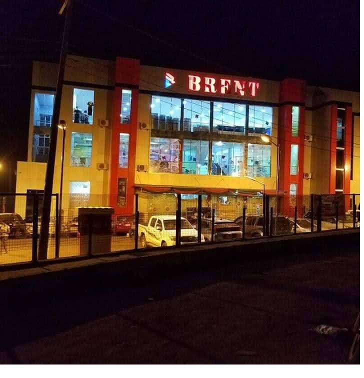 Completed retail plaza, lit at night