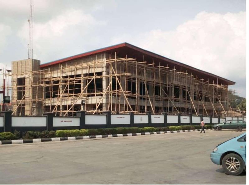 Multi-storey commercial frame with scaffold to the façade